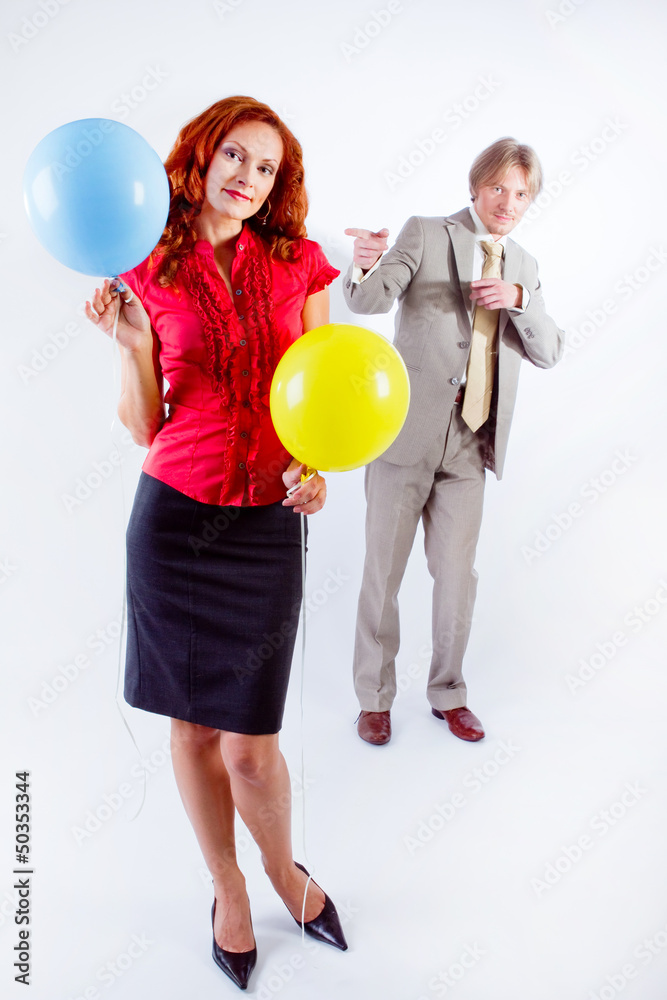 Business man and woman with air balloons Business man and woman with air balloons