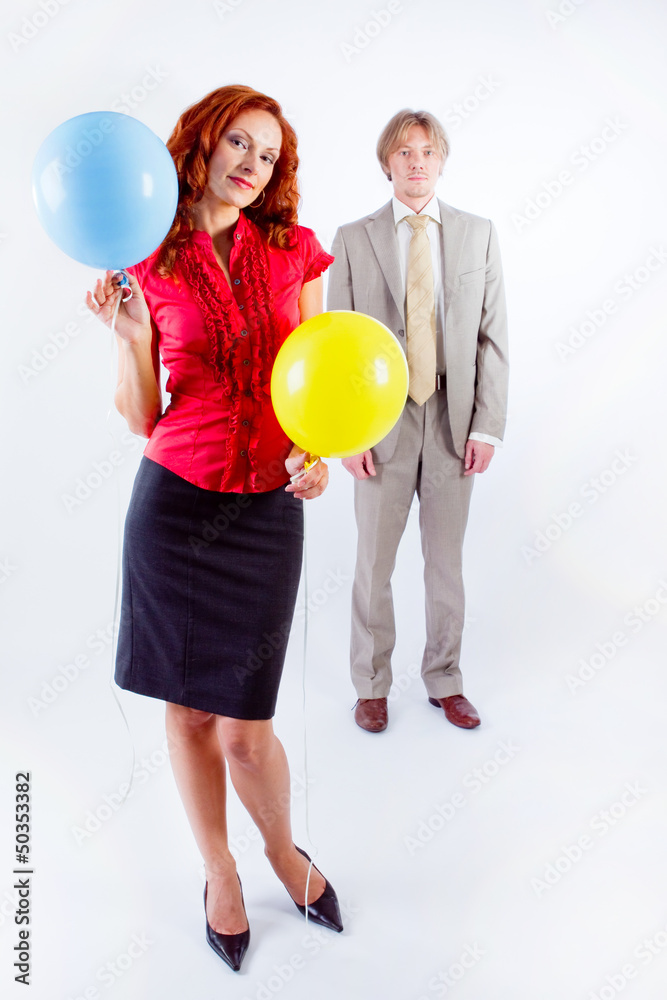 Business man and woman with air balloons Business man and woman with air balloons