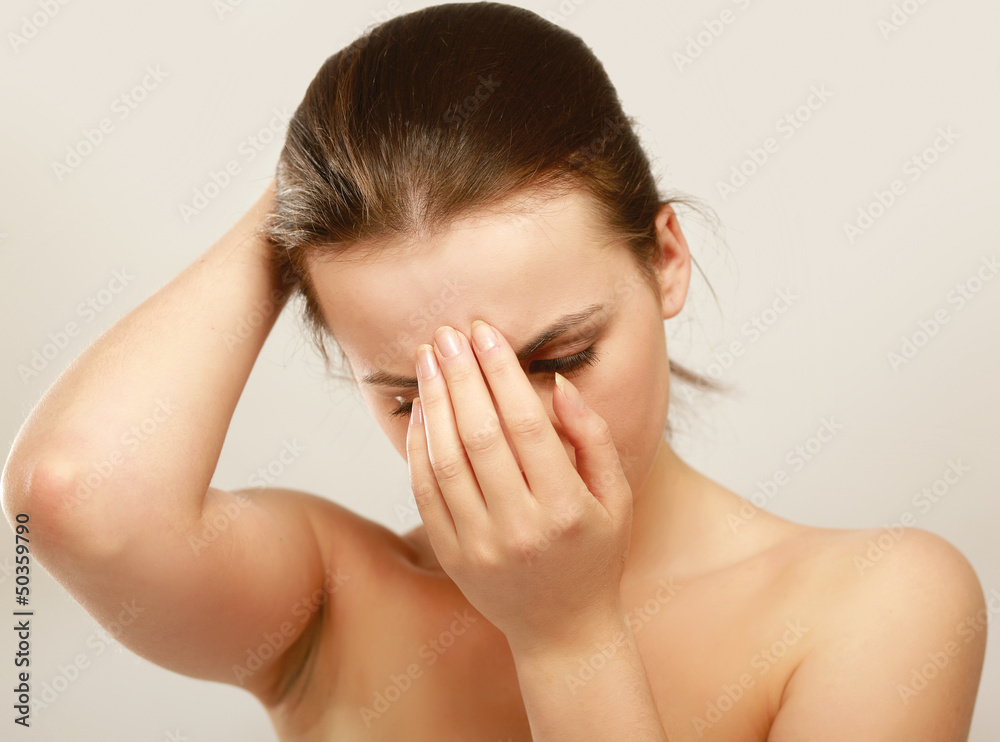 Young woman with head pain on white background Young woman with head pain on white background