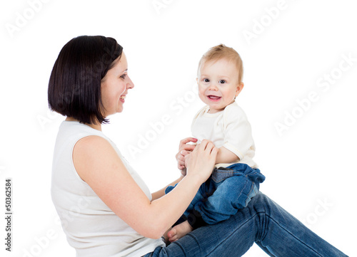 Happy mother having fun wit...