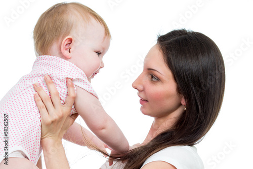 Loving mother looking at he...