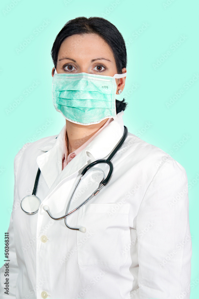 doctor with mask and stethoscope, isolated green doctor with mask and stethoscope, isolated green