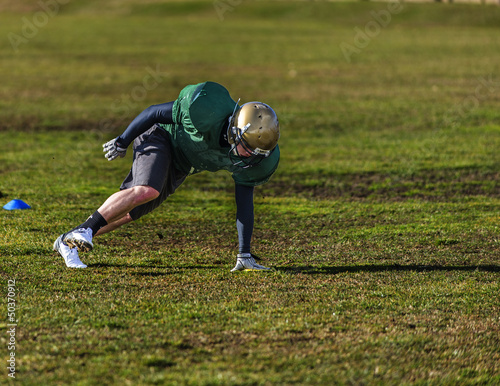 American football player on the practice very low