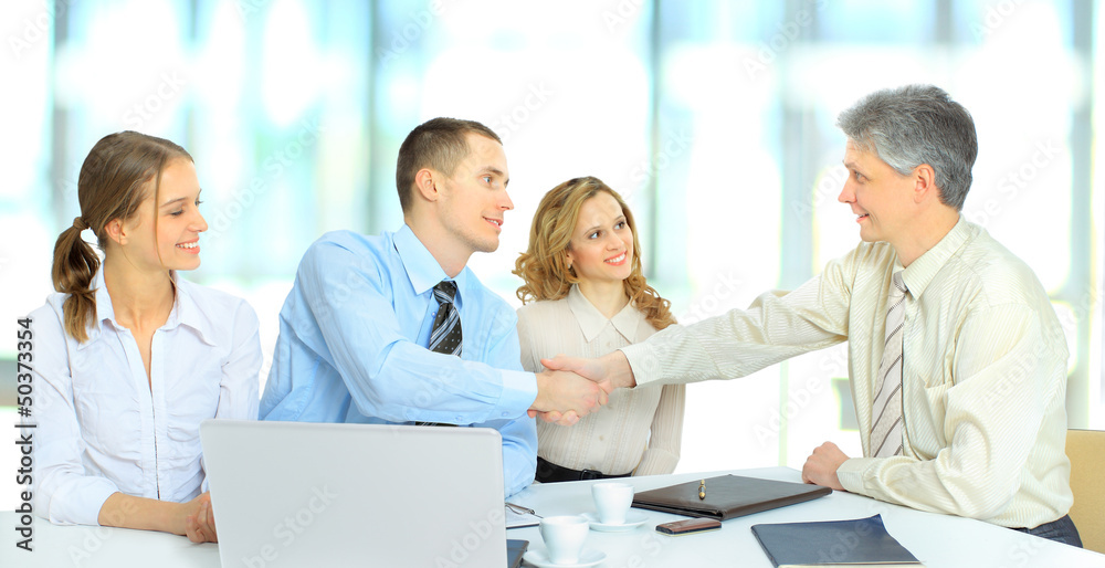 Group of businessmen discussing income. Group of businessmen discussing income.