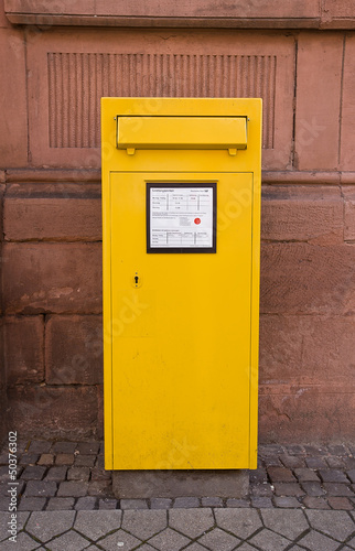 Yellow mailbox in Offenburg, Germany