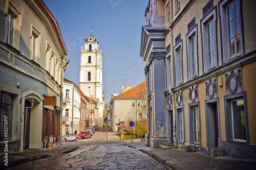 Vilnius oldtown street in sunny day photo