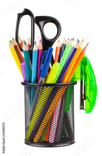Office cup with scissors, pencils and pens