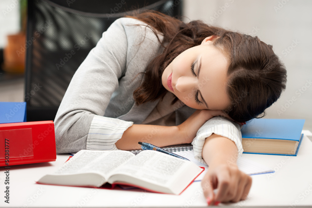 bored and tired woman sleeping on the table bored and tired woman sleeping on the table