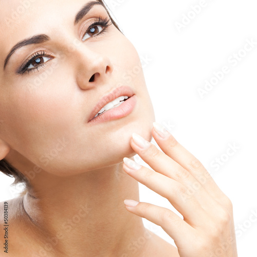 Woman touching skin or applying cream, isolated