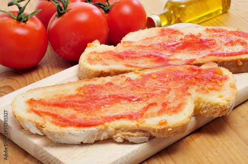 pa amb tomaquet, bread with tomato, typical of Catalonia, Spain photo