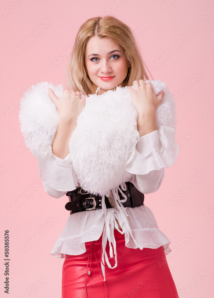 Young woman with heart symbol on Valentine Day Young woman with heart symbol on Valentine Day