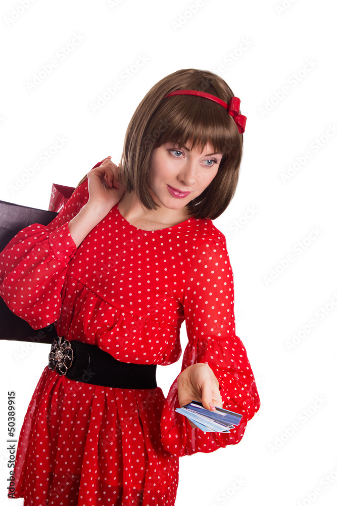 Woman with a credit card and shopping bags Woman with a credit card and shopping bags