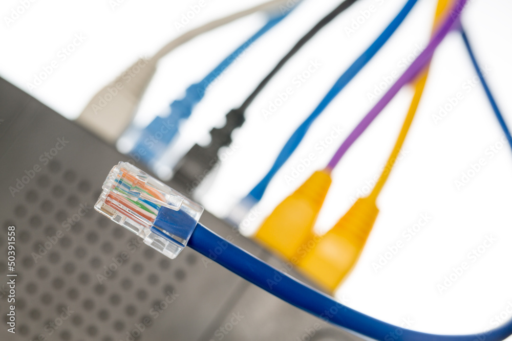 Cat5 cables and router for cyberdefence concept Cat5 cables and router for cyberdefence concept
