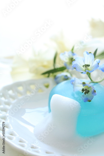 Delphinium and herb soap with bubbles for beauty image