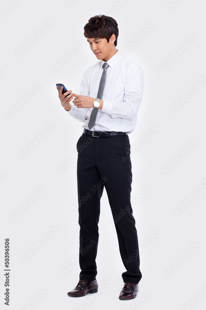 Asian business man with cellphone. Asian business man with cellphone.