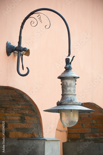 Old lamp on a wall