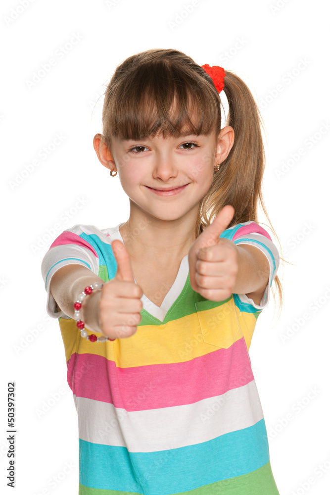 Cheerful girl holds her thumbs up Cheerful girl holds her thumbs up