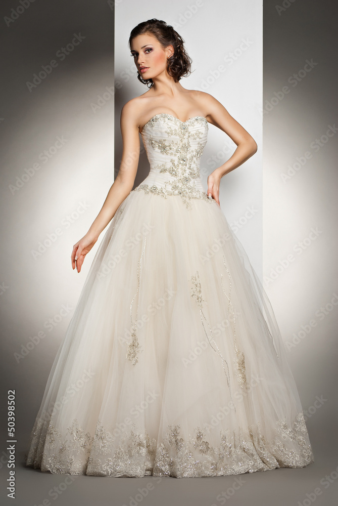 The beautiful young woman in a wedding dress The beautiful young woman in a wedding dress