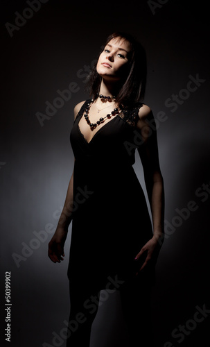 Beautiful girl in black dress