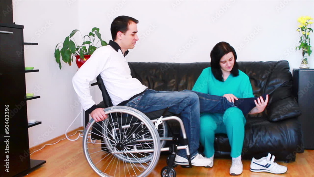 Physical therapist working with patient Physical therapist working with patient