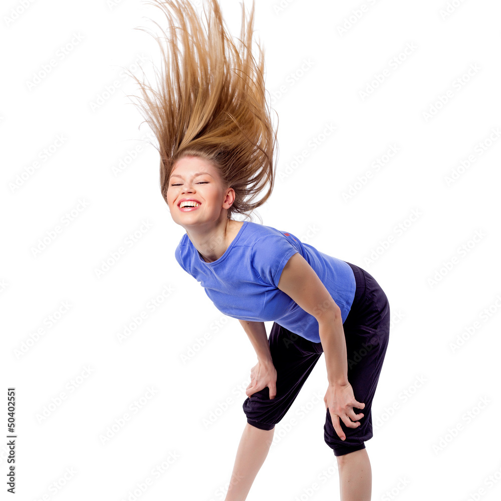 Pretty girl in zumba dancing pose with disheveled hair Pretty girl in zumba dancing pose with disheveled hair