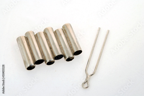 Cuadro en lienzo Musical tuning fork and pipe for guitar