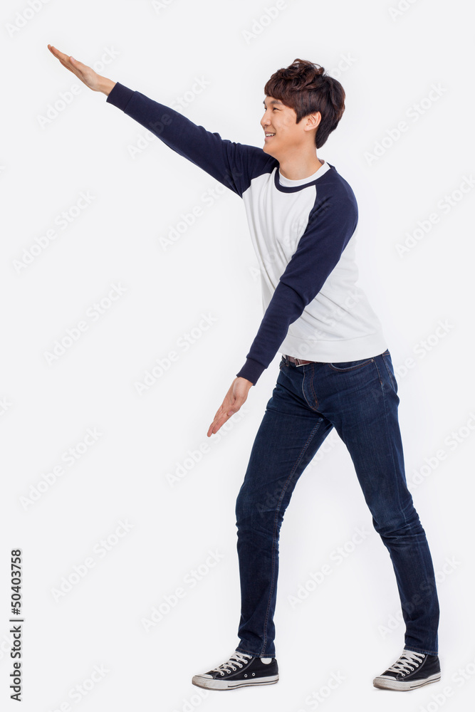 Asian man present something