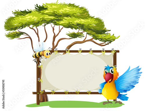 An empty framed banner with a parrot and a a bee