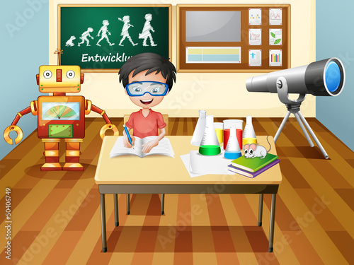 A boy inside a science laboratory