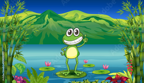 A frog standing above a water lily