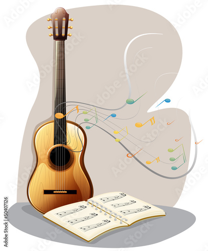 A guitar with a musical book