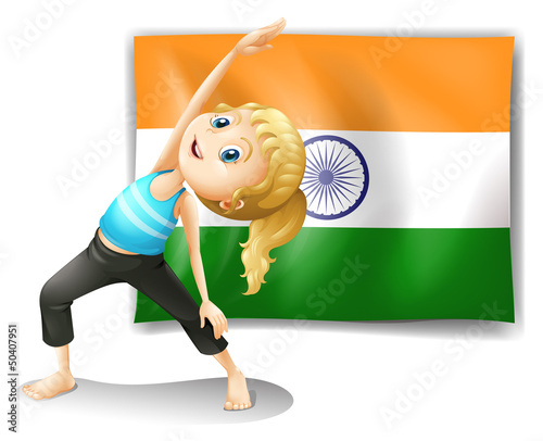 A girl exercising in front of the flag of India