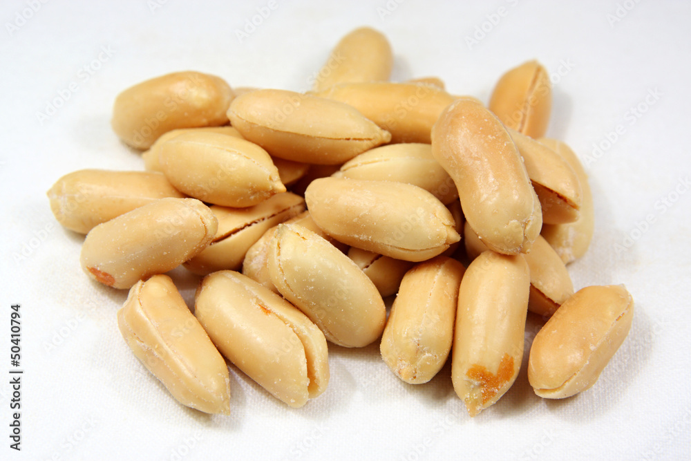 Peanuts heap against white background Peanuts heap against white background