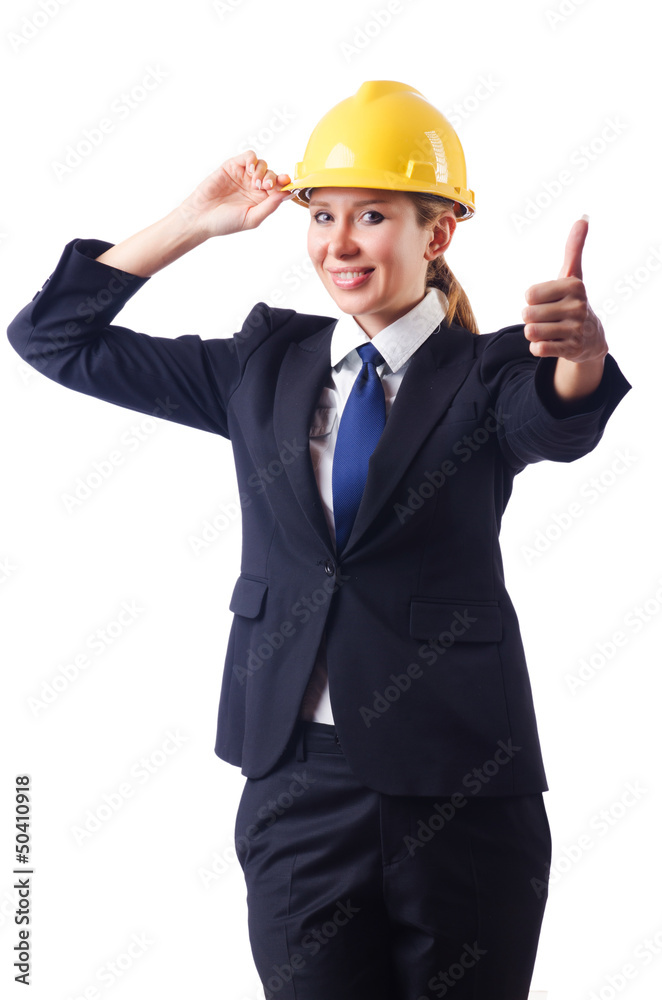 Young businesswoman with hard hat on white