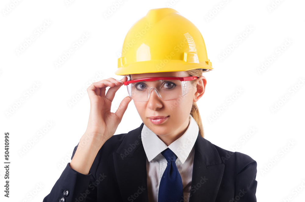 Young businesswoman with hard hat on white Young businesswoman with hard hat on white