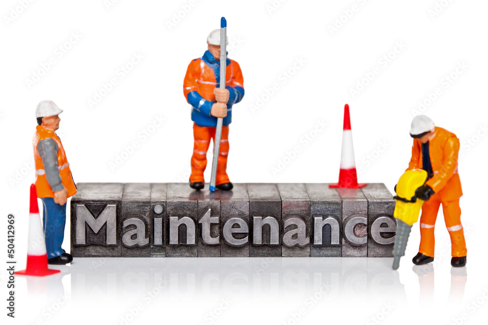 Fototapeta premium Maintenance word in letterpress with miniature workmen