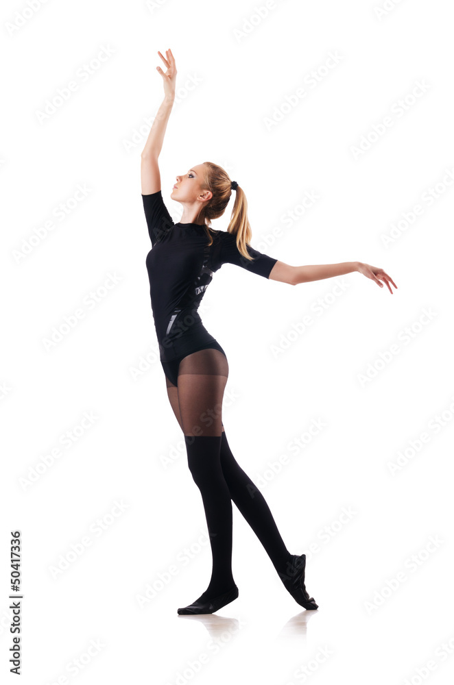 Young woman dancing on white background