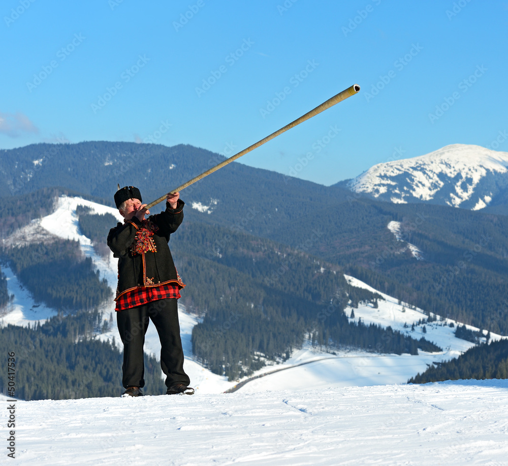 A man with trembitas
