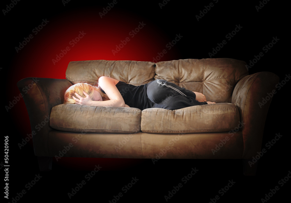 Sad Depressed Girl with Pain on Couch Sad Depressed Girl with Pain on Couch