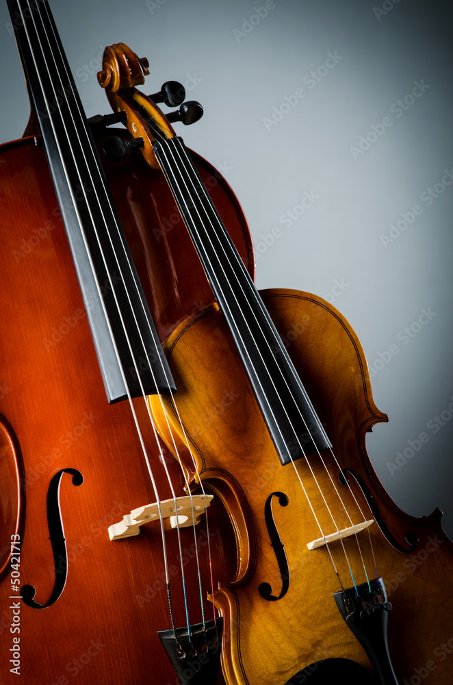 Fototapeta premium Violin in dark room - music concept