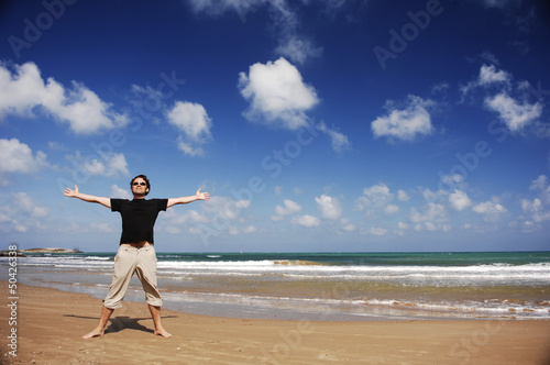 Man Standing At The Beach