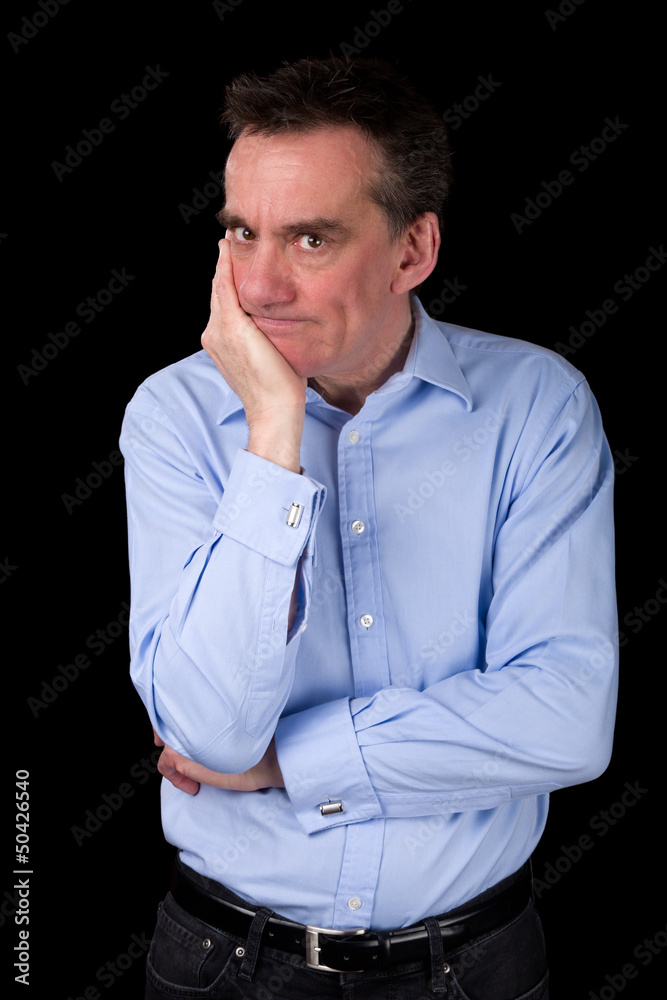 Angry Frowning Business Man with Hand to Chin Angry Frowning Business Man with Hand to Chin