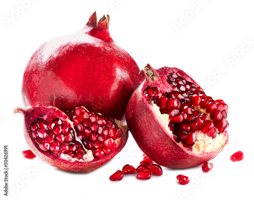 Fototapeta Naklejka Na Ścianę i Meble -  Pomegranates isolated on a White Background. Organic Bio fruits