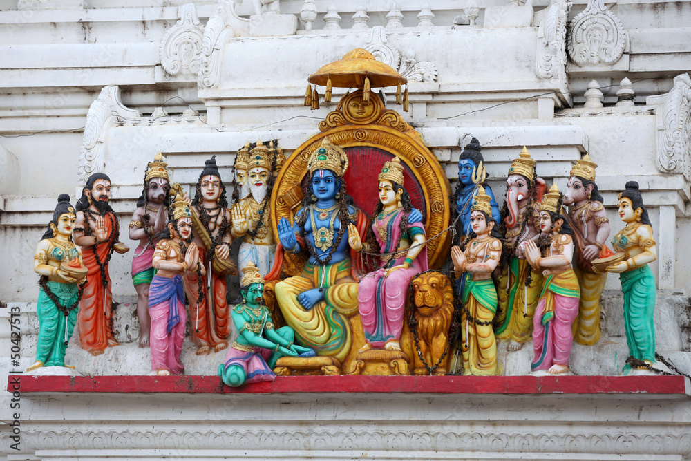Different Hindu gods sculpted on temple