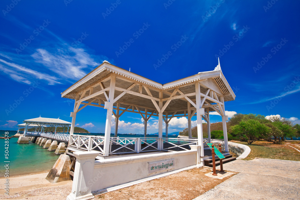 fishing boat and wood waterfront pavilion. fishing boat and wood waterfront pavilion.
