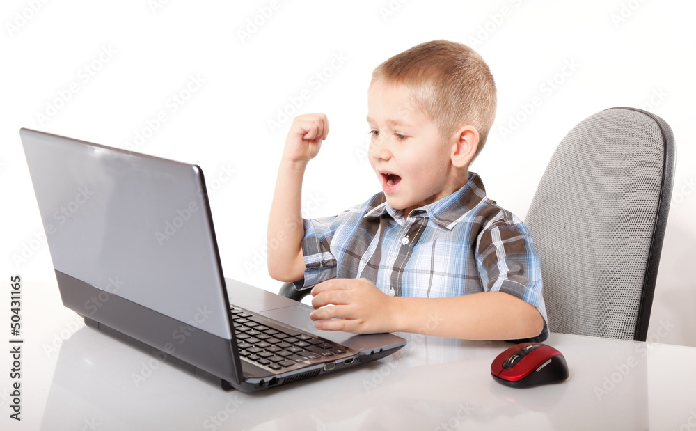 Computer addiction emotional boy with laptop Computer addiction emotional boy with laptop