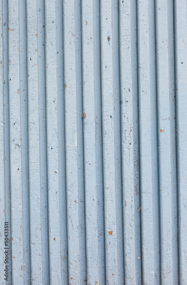 blue old painted wooden fence, naturally weathered blue old painted wooden fence, naturally weathered