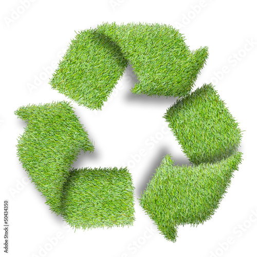 Recycle logo symbol from the green grass, isolated on white