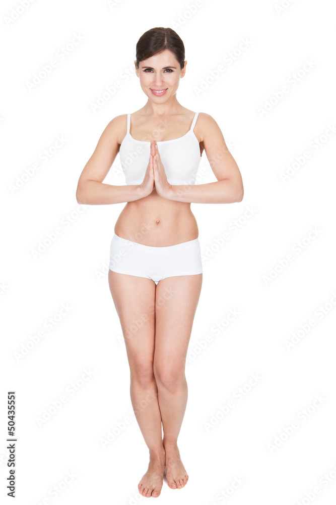 Young Woman Practicing Yoga Young Woman Practicing Yoga