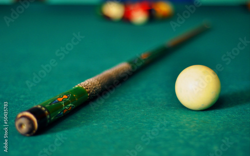 billiard table stick and balls